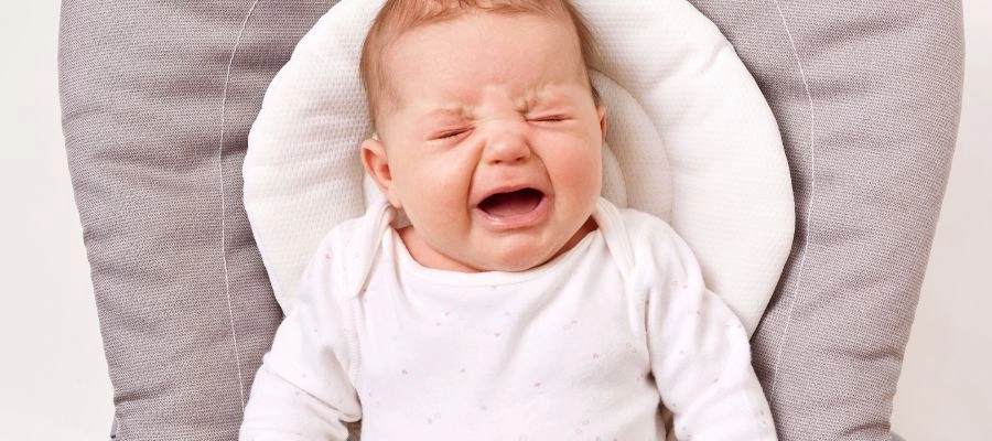 Imagem do post bebê chorando em um berço